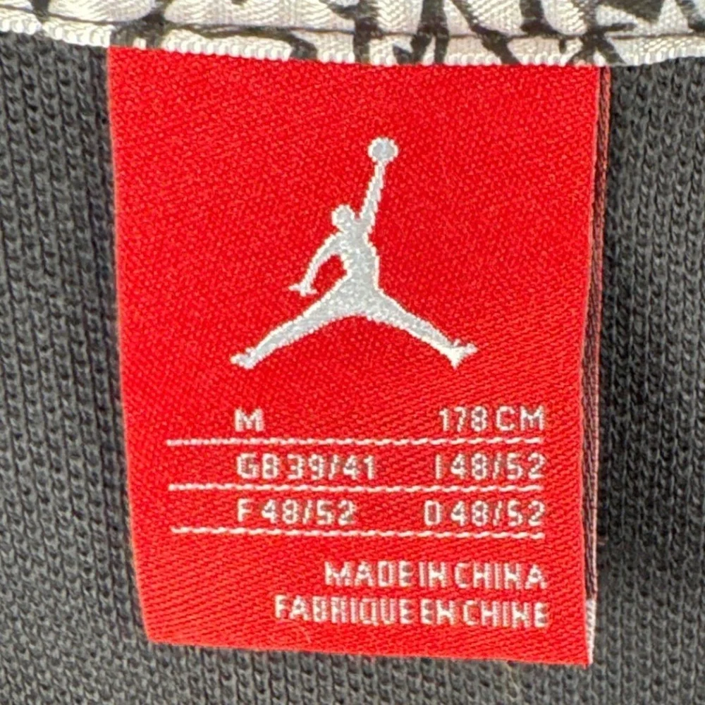 Jordan Polo Men M Black Jumpman Elephant Print Short Sleeve EUC